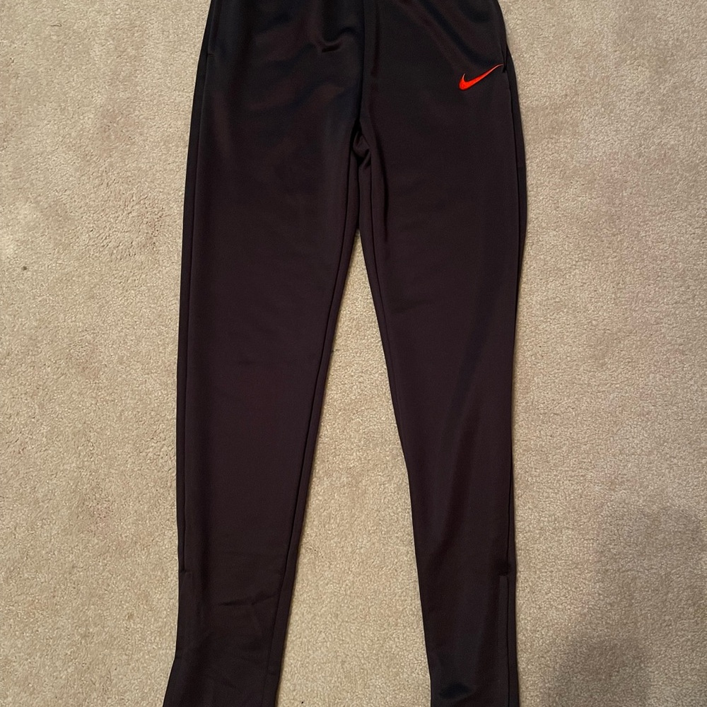 Nike Kids Black Joggers with Red Swoosh